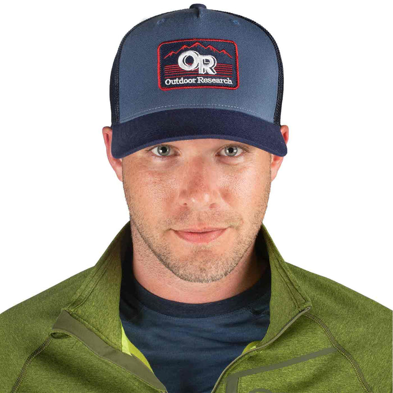 Load image into Gallery viewer, outdoor research advocate trucker cap vintage on head 1
